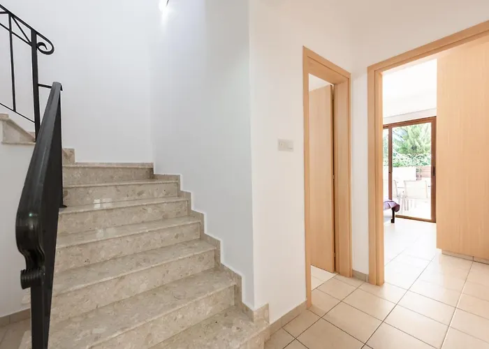 Iris By Ezoria Villa *